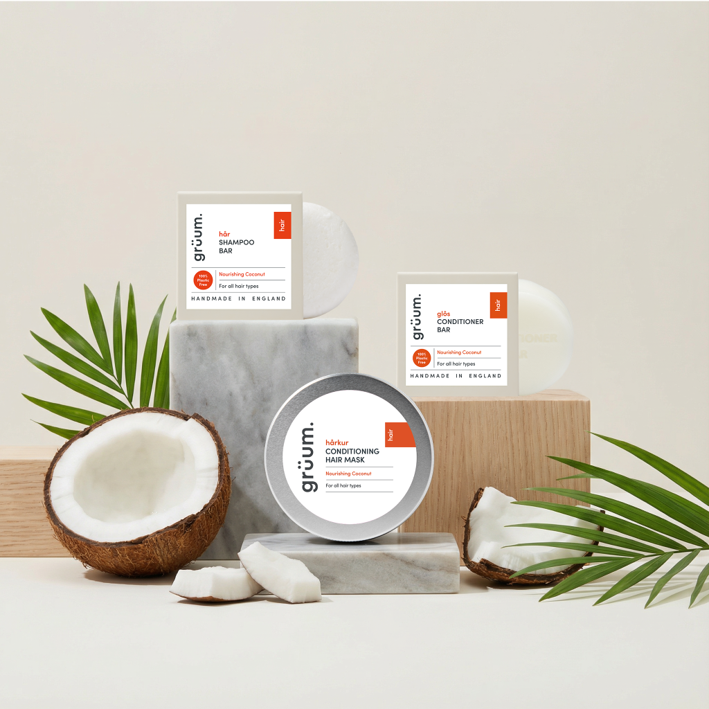 Coconut hair products displayed on marble blocks.