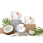 Coconut hair care products with palm leaves.