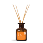 Brown reed diffuser bottle on black background.