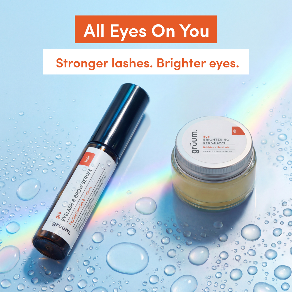 Eye serum and cream with water droplets.