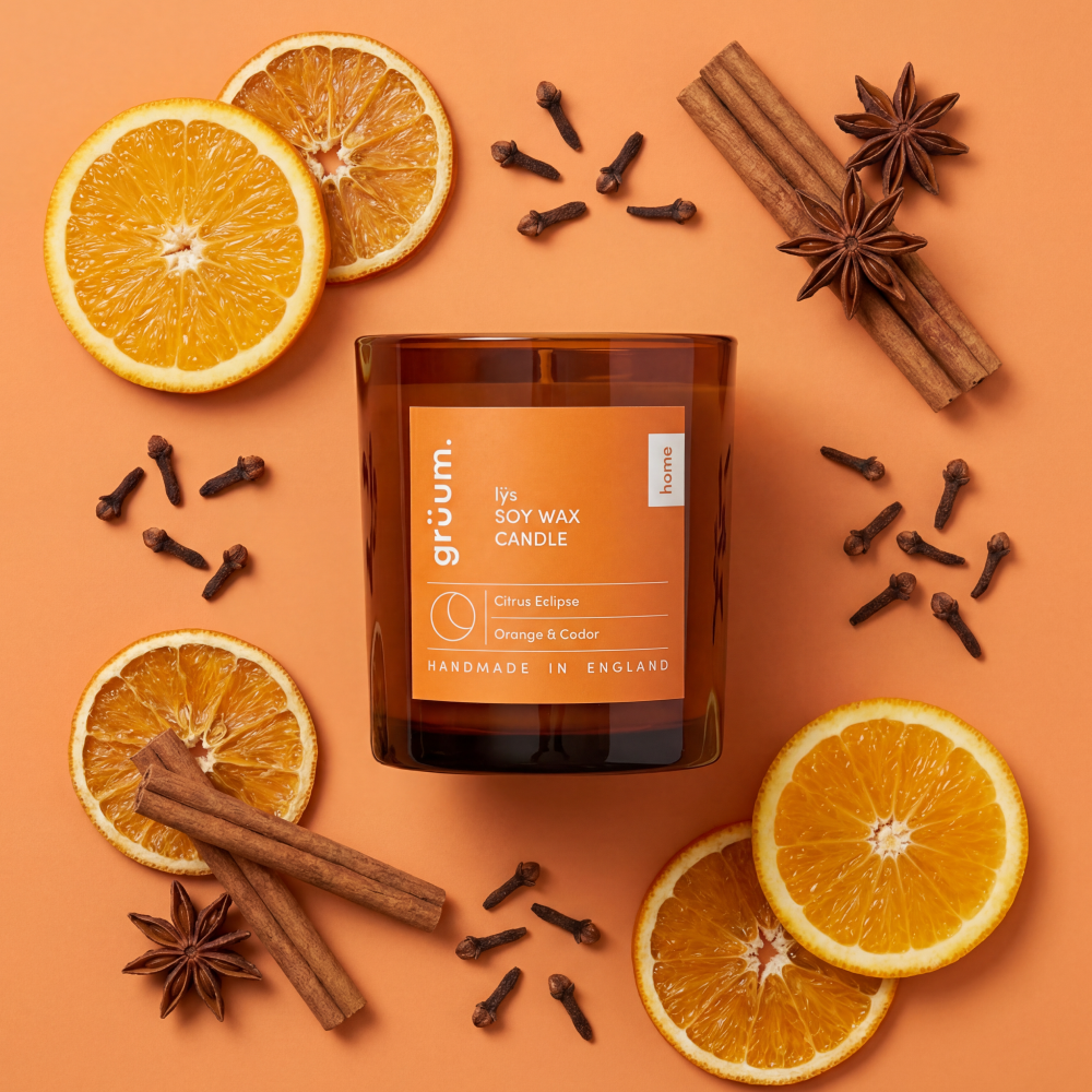 Candle with oranges and spices