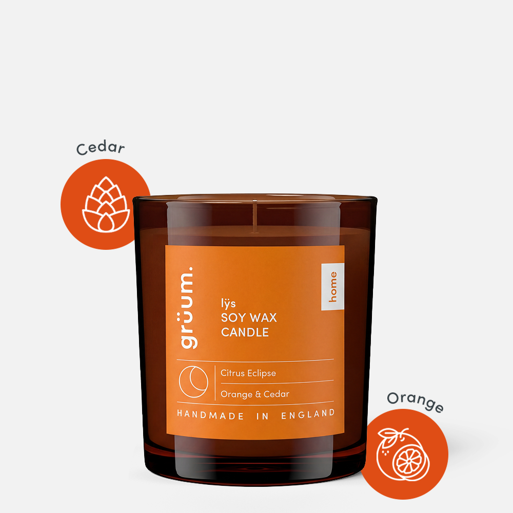 Orange and cedar soy wax candle.