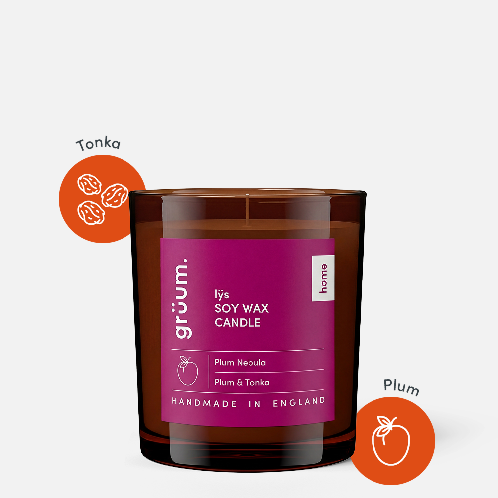 Brown soy wax candle with plum fragrance.