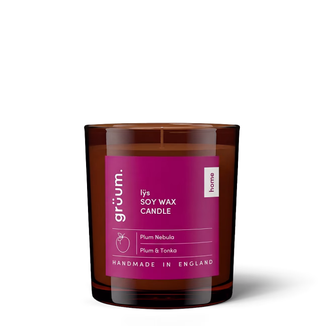 Soy wax candle with purple label.