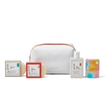 Beauty products and white toiletry bag.