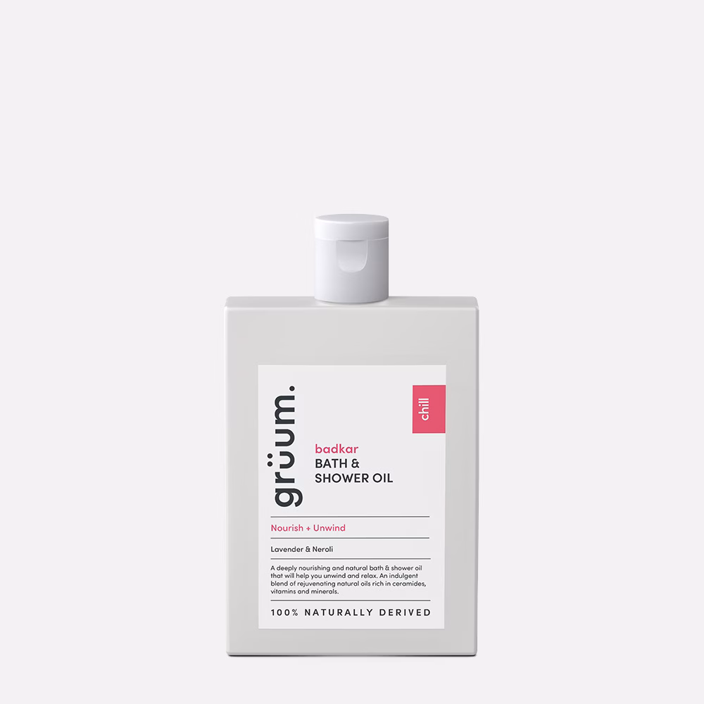 Minimalist white bath and shower oil bottle