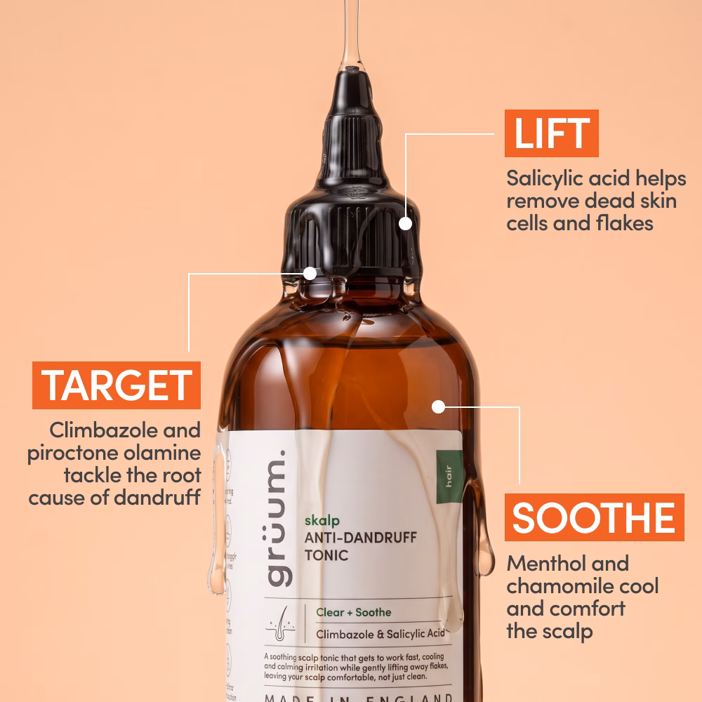 Amber anti-dandruff tonic bottle with dropper