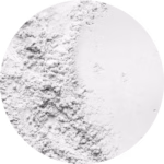 Circular close-up of white powder with smooth and clumped textures